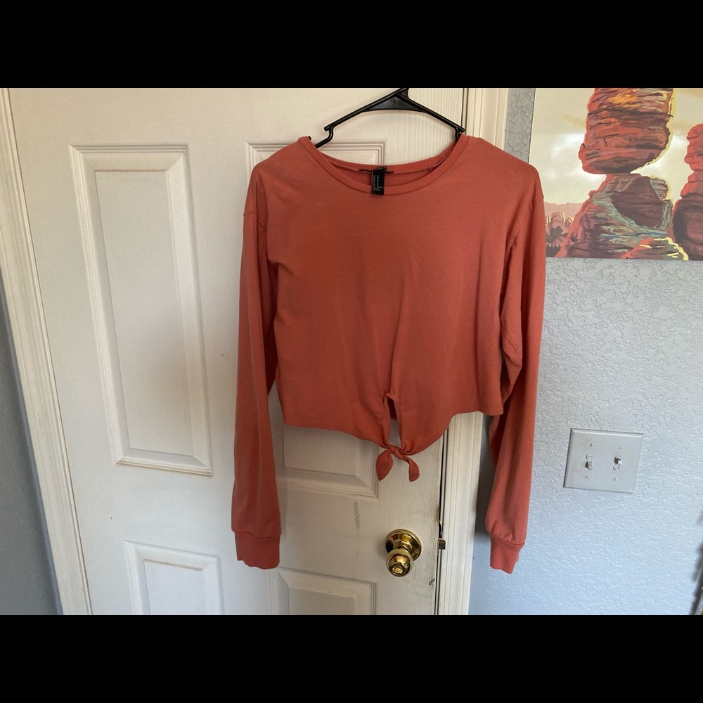 Salmon colored Forever 21 long-sleeved crop top